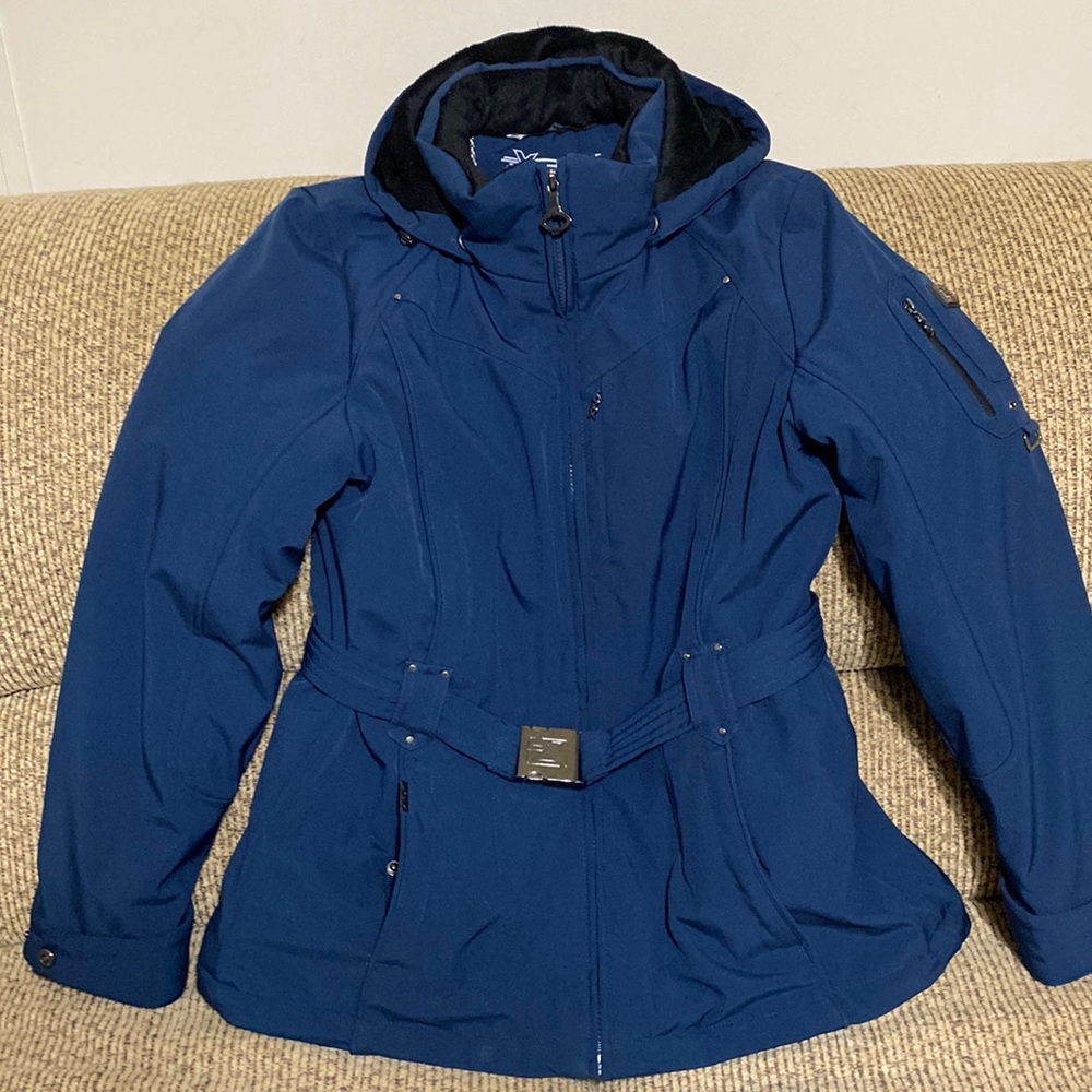 Navy blue coat with belt. Worn one time. Runs a bit small.